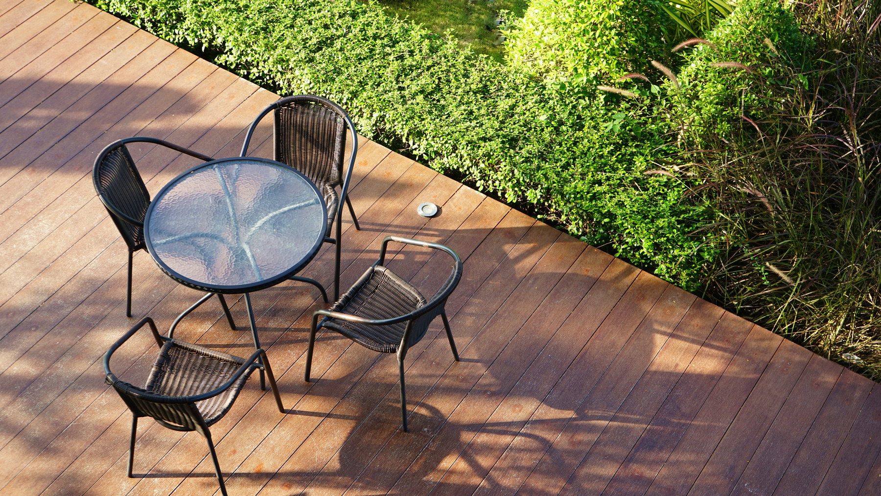 Garden chairs on wood terrace